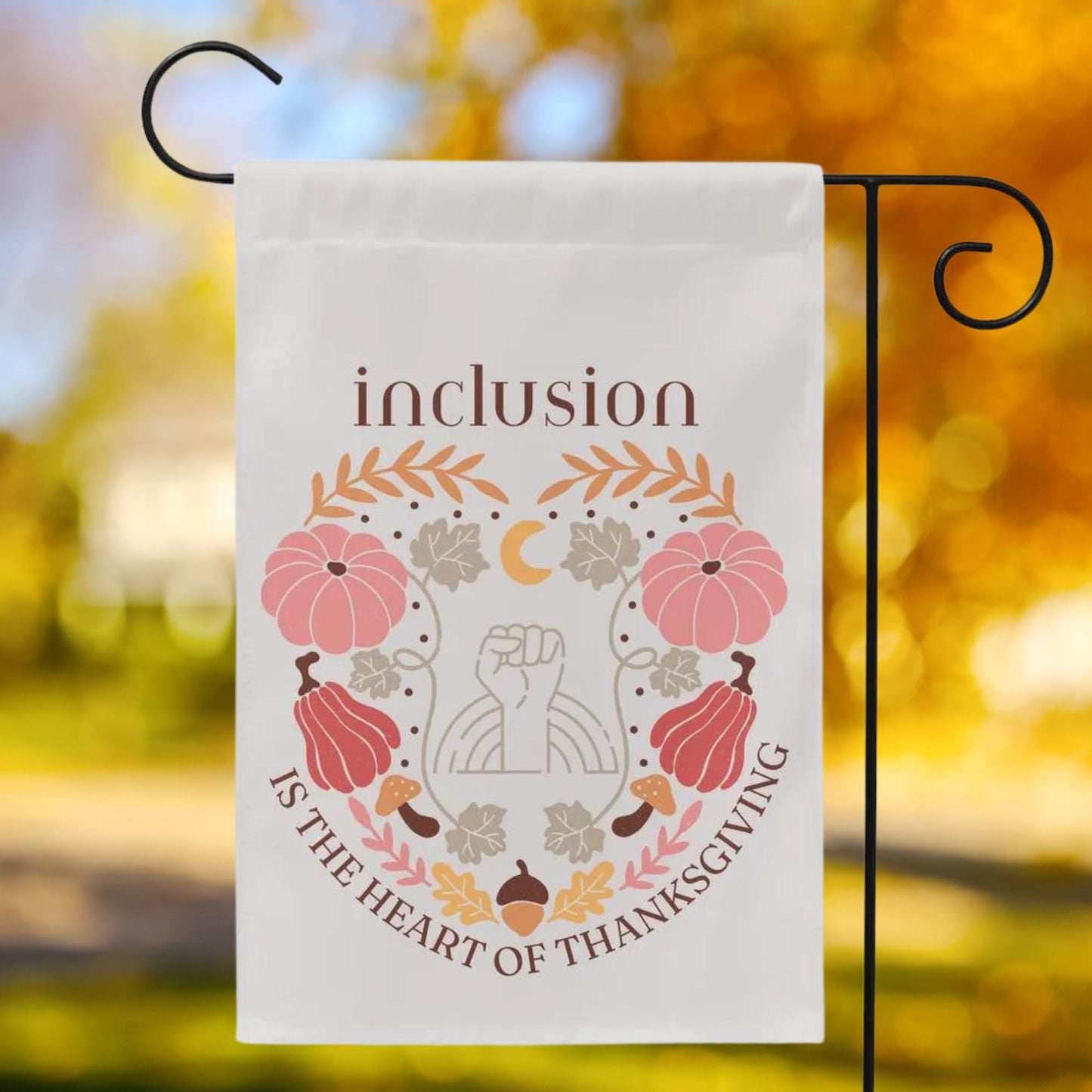 boho thanksgiving graphics with human rights equality fist in center. Text reads 'inclusion is the heart of thanksgivng'