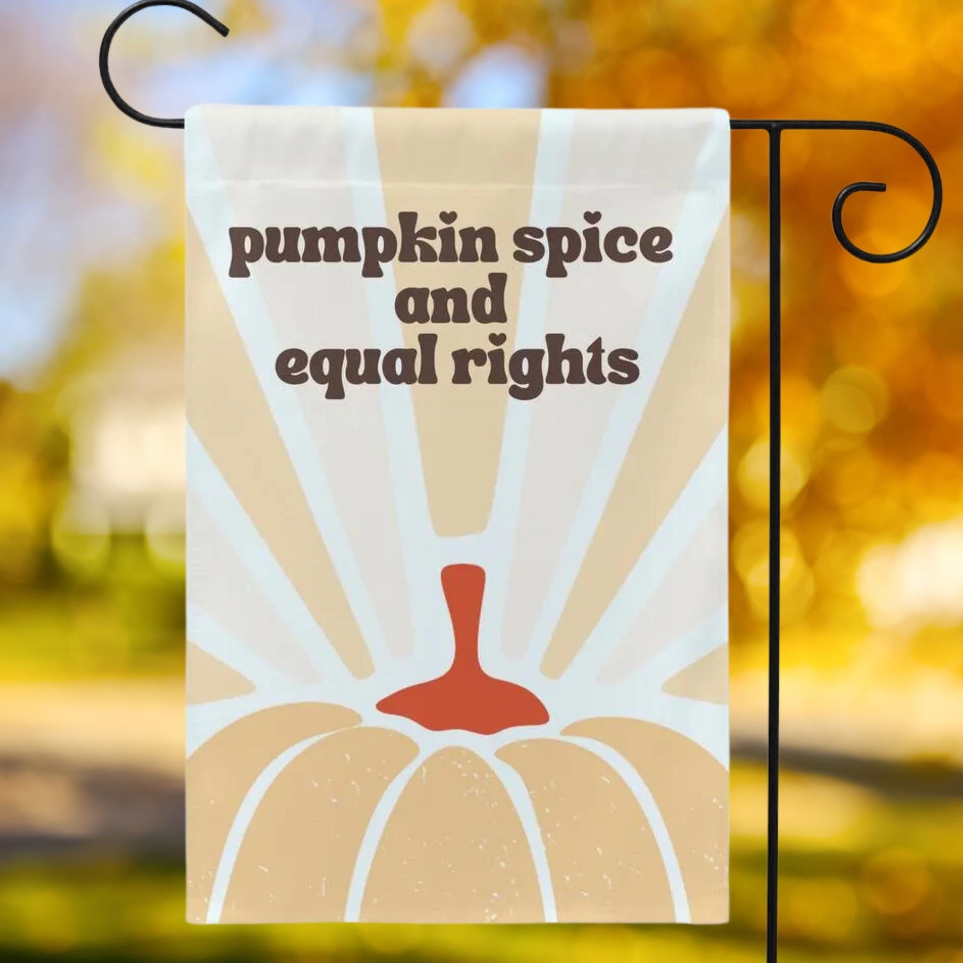 Garden flag with Boho pumpkin illustration that reads 'pumpkin spice and equal rights' at the top of flag.