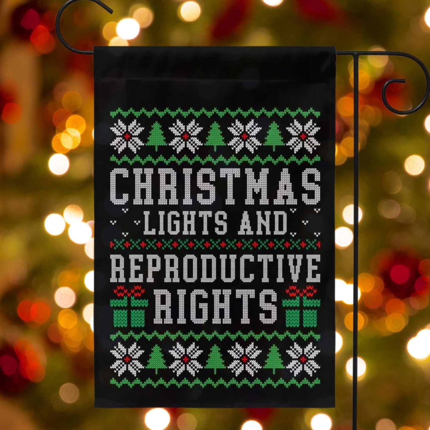 christmas lights and reproductive rights sign, reproductive rights banner, bans off our bodies, roe your vote, ban ignorance not books flag