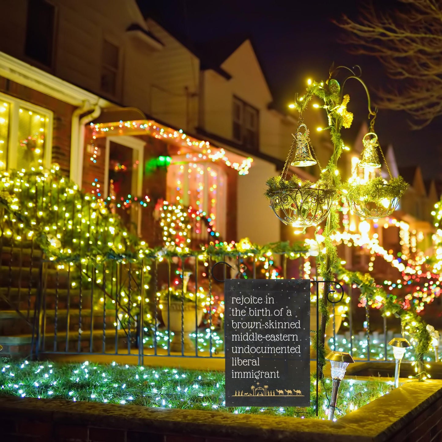 rejoice in the birth of a brown skinned middle eastern undocumented liberal immigrant Jesus christmas garden flag, unapologetic democrat art