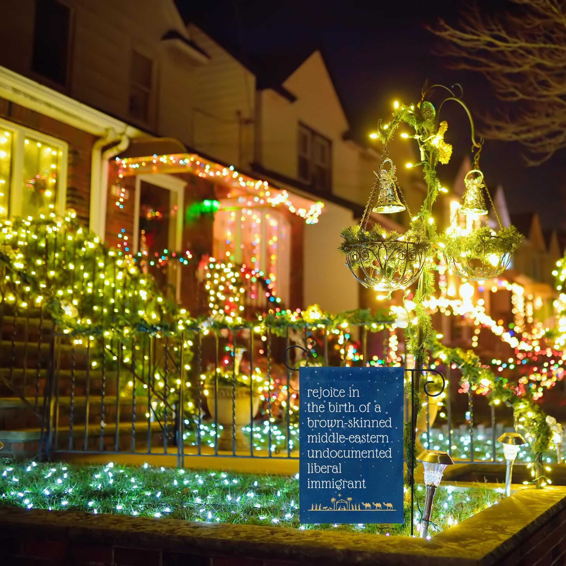 rejoice in the birth of a brown skinned middle eastern undocumented immigrant Jesus christmas garden flag, christmas lights equal rights